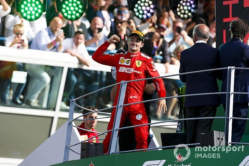 Charles Leclerc, Ferrari, 1st position, celebrates on the podium