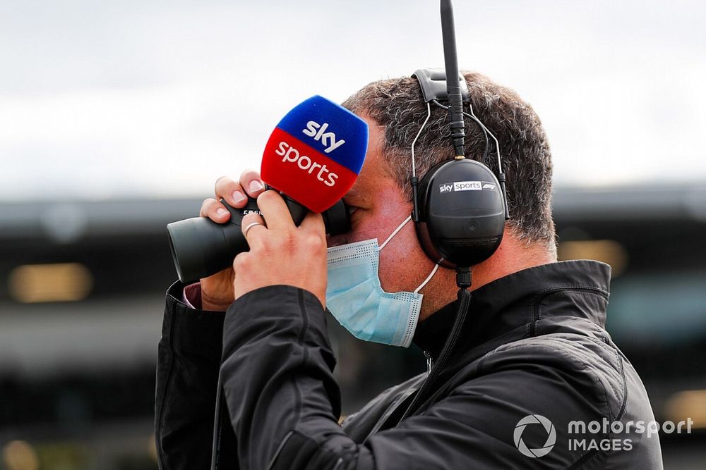 Martin Brundle, Sky TV, on the grid with binoculars