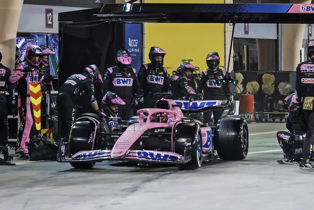Esteban Ocon, Alpine A523, leaves his pit box after a stop