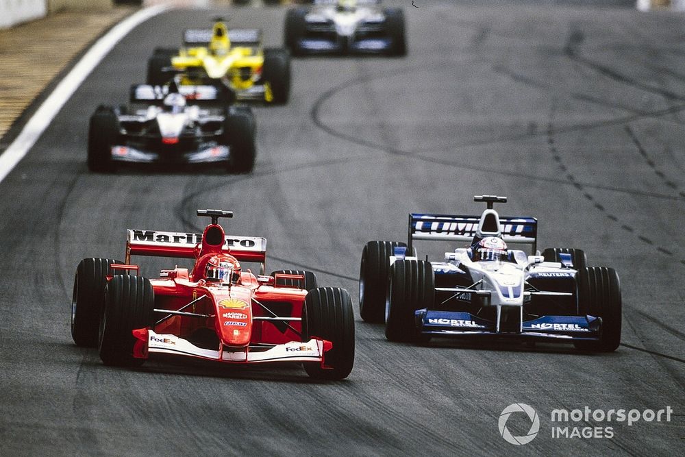 Michael Schumacher, Ferrari F2001, battles with Juan Pablo Montoya, Williams FW23 BMW