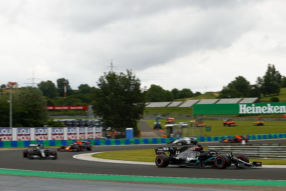 Lewis Hamilton, Mercedes F1 W11, leads Valtteri Bottas, Mercedes F1 W11, and Alex Albon, Red Bull Racing RB16