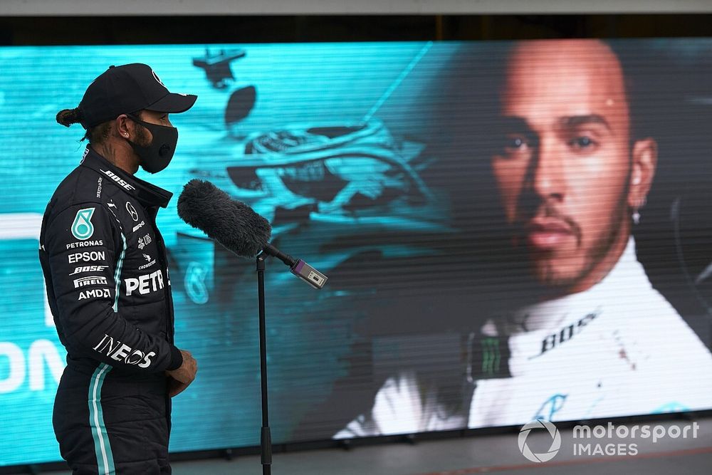 Pole Sitter Lewis Hamilton, Mercedes-AMG Petronas F1 talks to the media in Parc Ferme 