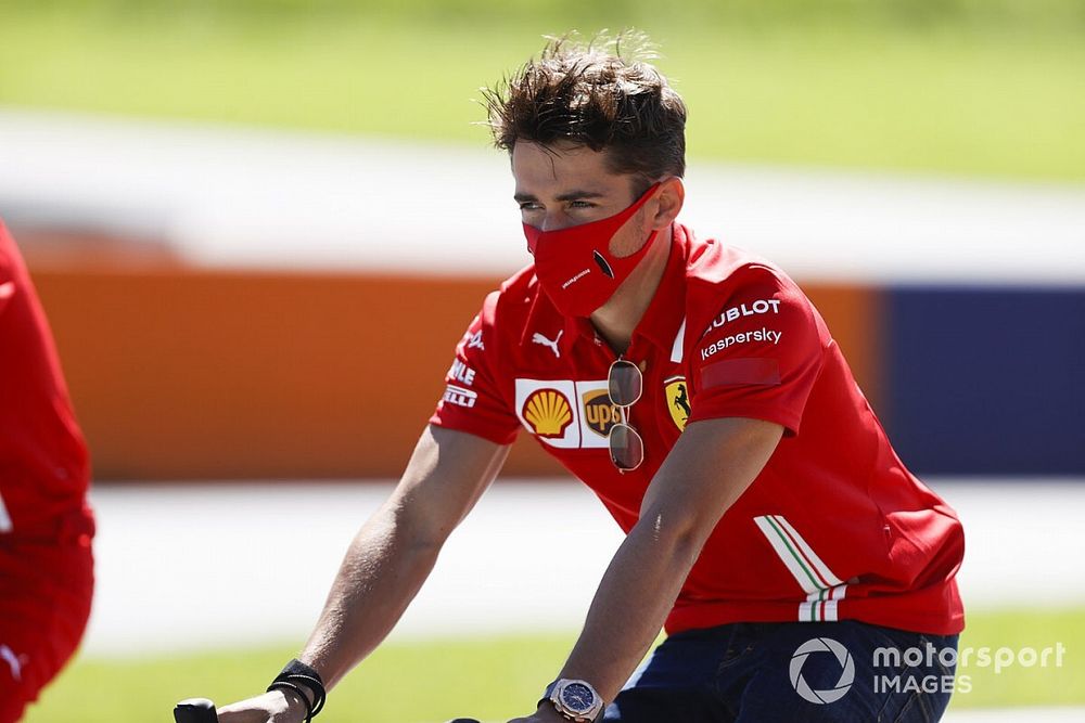 Charles Leclerc, Ferrari walks the track on a bike