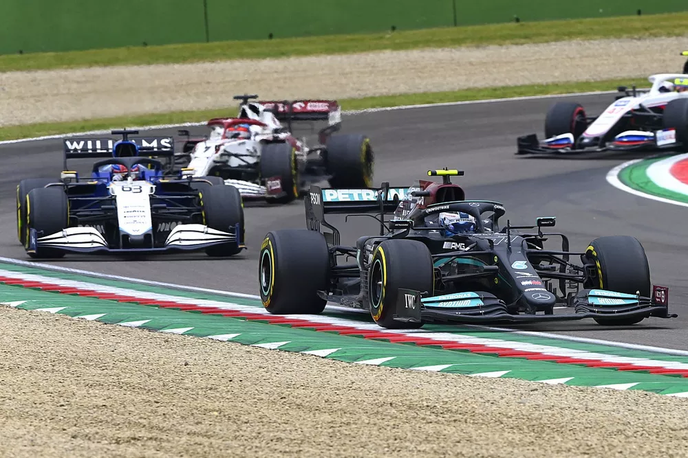 Valtteri Bottas, Mercedes W12, George Russell, Williams FW43B, Kimi Raikkonen, Alfa Romeo Racing C41 ,and Mick Schumacher, Haas VF-21