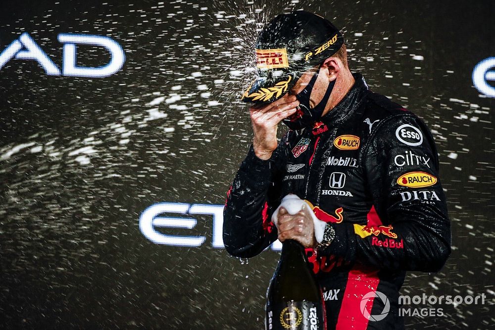 Max Verstappen, Red Bull Racing, 1st position, sprays champagne on the podium