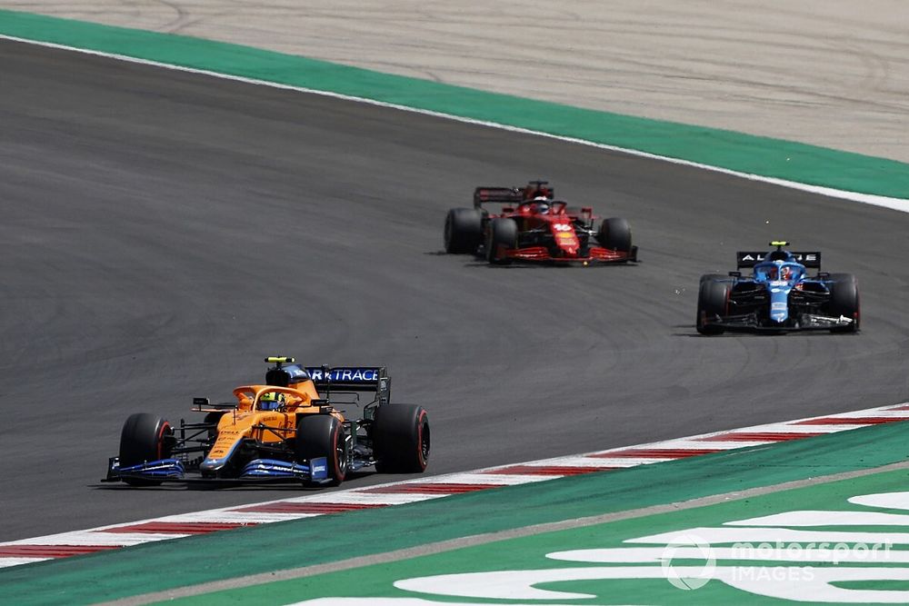 Lando Norris, McLaren MCL35M, Esteban Ocon, Alpine A521, and Charles Leclerc, Ferrari SF21