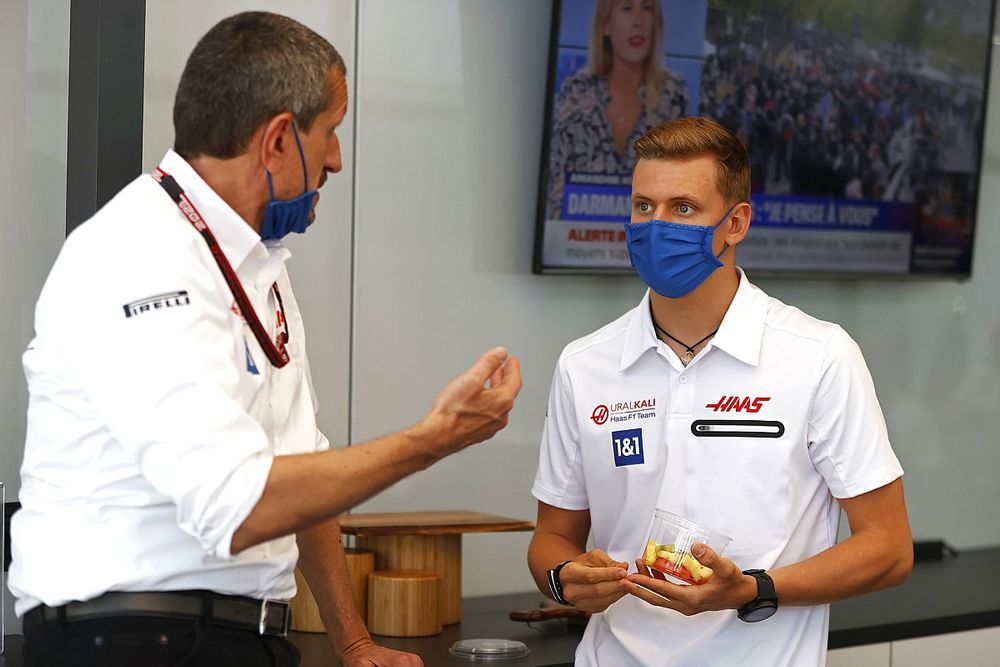 Guenther Steiner, Team Principal, Haas F1, and Mick Schumacher, Haas F1