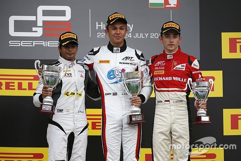 Podium: Race winner Alexander Albon, ART Grand Prix; second place Arjun Maini, Jenzer Motorsport; third place Charles Leclerc, ART Grand Prix