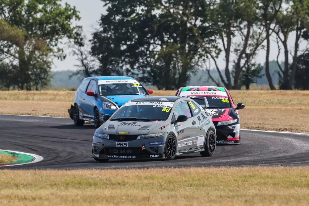 Dave Marshall (66) won the first Civic race ahead of Alistair Camp (45)