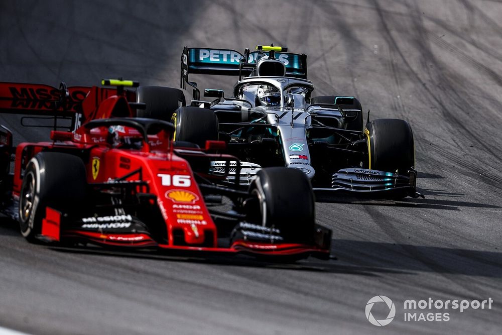 Charles Leclerc, Ferrari SF90 and Valtteri Bottas, Mercedes AMG W10 battle 