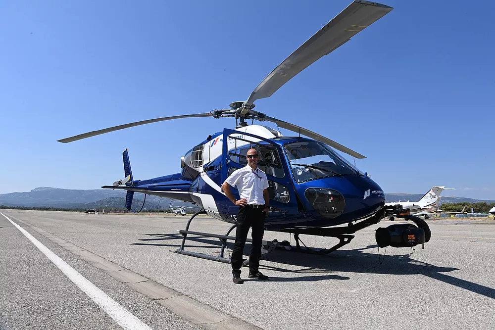 Lieven Hermans, operador de c&aacute;mara a&eacute;rea para la F1 y la c&aacute;mara Shotover F1 montada en un helic&oacute;ptero