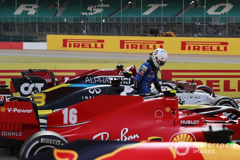 Lando Norris, McLaren, exits his car in parc ferme