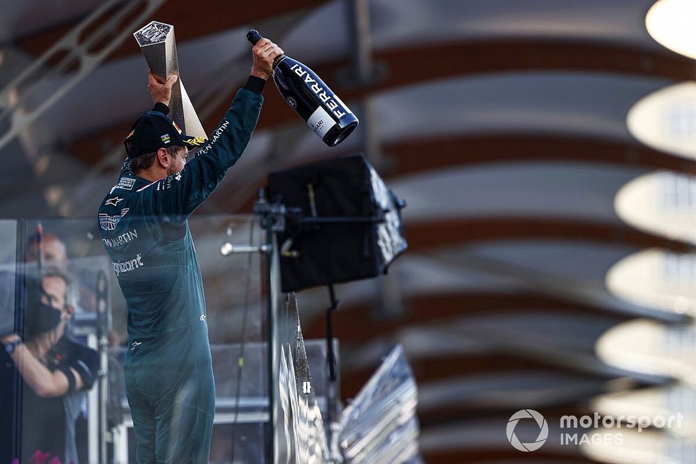 Sebastian Vettel, Aston Martin, 2nd position, with his trophy and Champagne