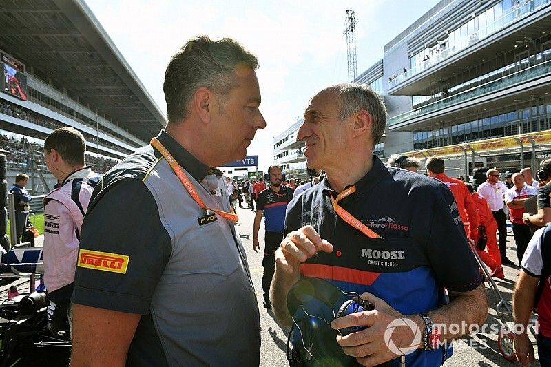 Mario Isola, Racing Manager, Pirelli Motorsport, and Franz Tost, Team Principal, Toro Rosso, on the grid