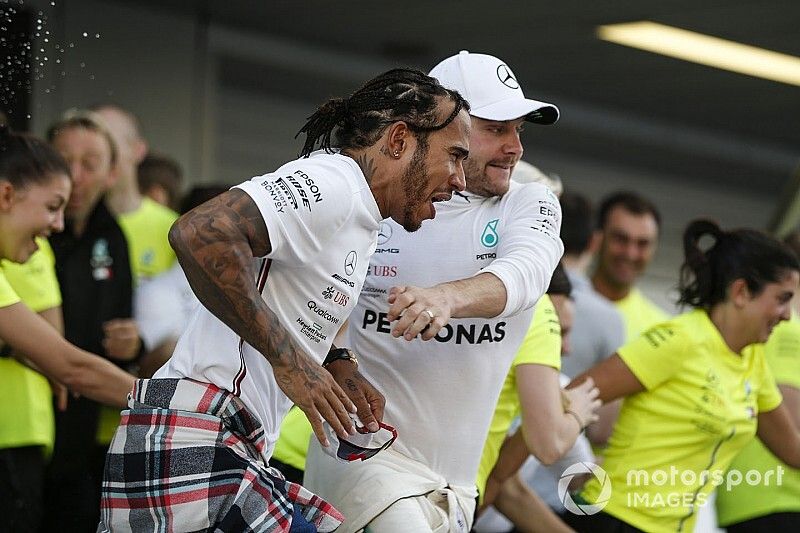 Valtteri Bottas, Mercedes AMG F1, 2nd position, Lewis Hamilton, Mercedes AMG F1, 1st position, and the Mercedes team celebrate a perfect result