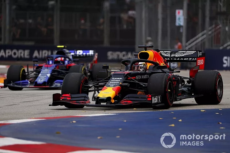 Max Verstappen, Red Bull Racing RB15 and Pierre Gasly, Toro Rosso STR14