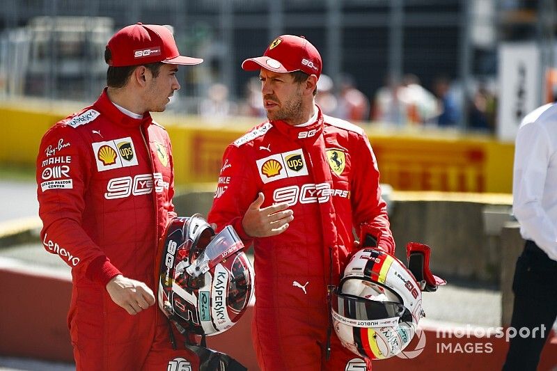 Charles Leclerc, Ferrari, with pole man Sebastian Vettel, Ferrari