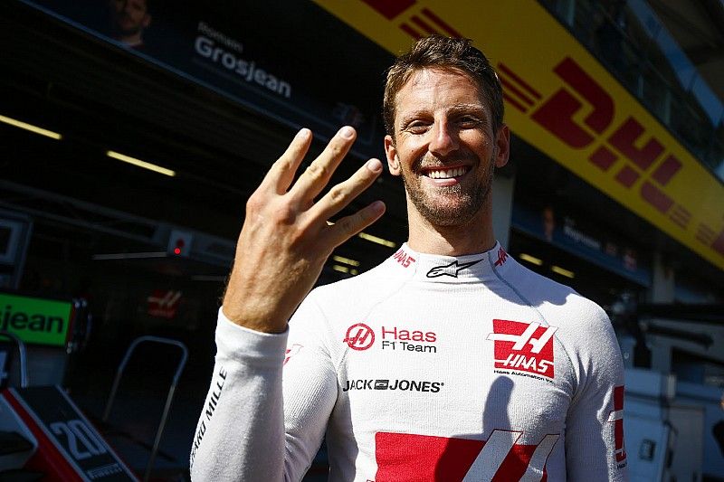 Romain Grosjean, Haas F1 Team, celebrates his fourth place