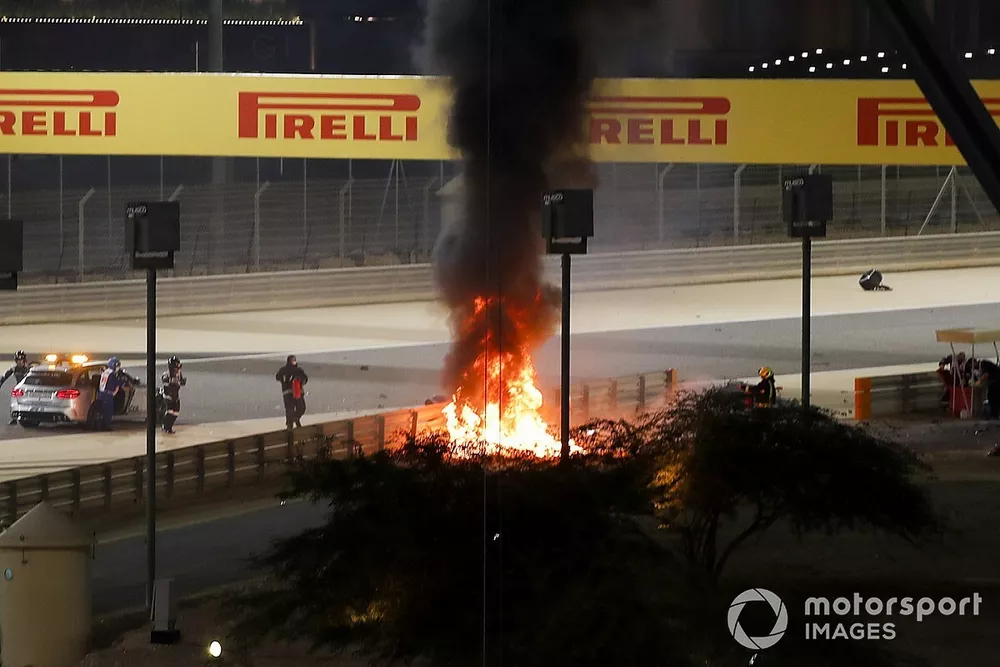 The crashed car of Romain Grosjean, Haas VF-20 on fire