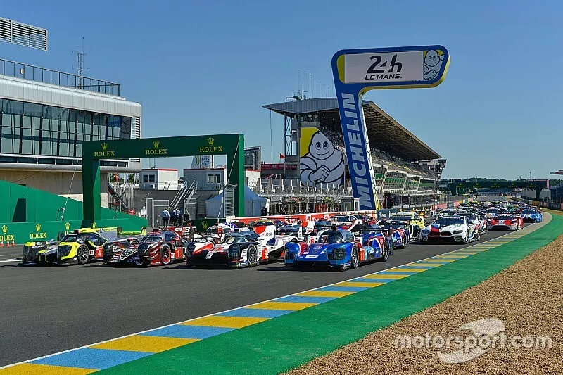 Official group photo with all cars