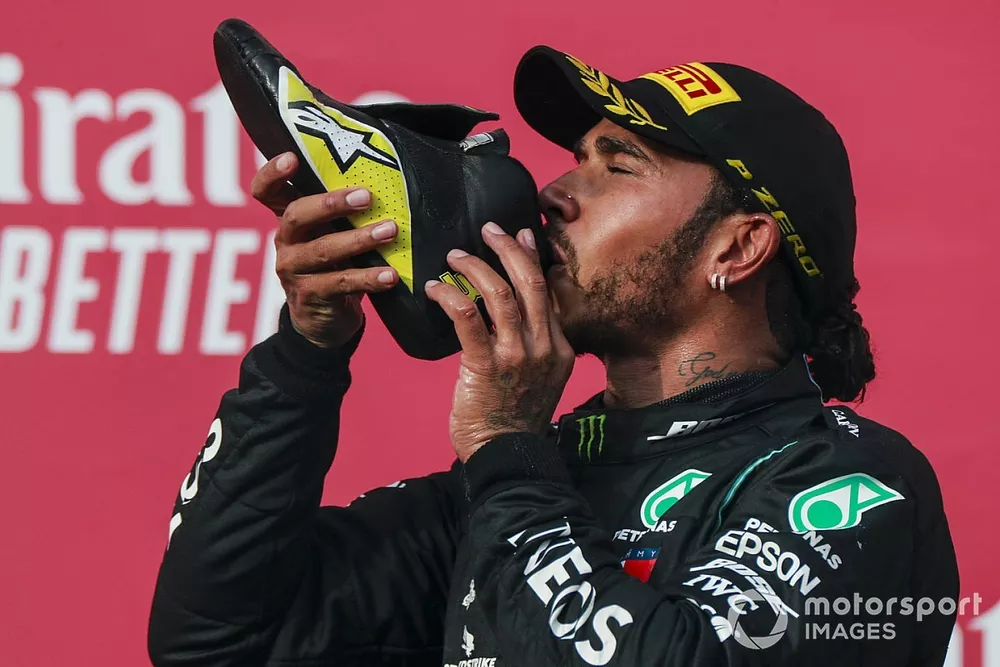 Race Winner Lewis Hamilton, Mercedes-AMG F1 celebrates on the podium with a shoey