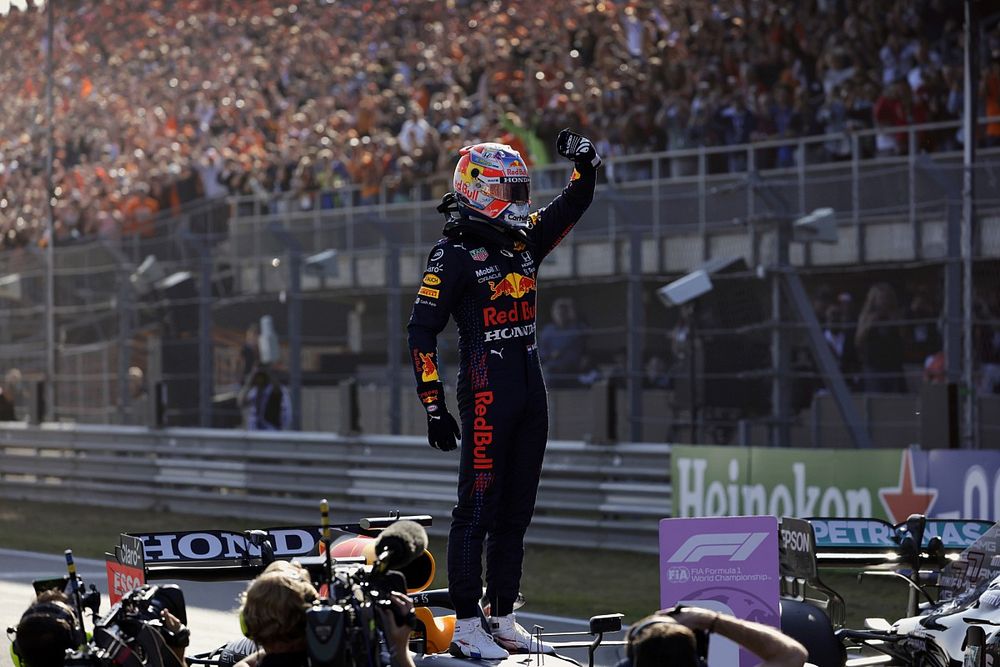 Max Verstappen, Red Bull Racing, celebrates with fans after securing pole