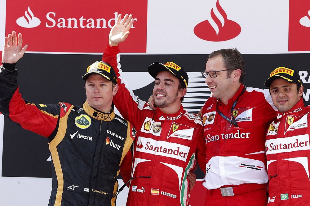 Podium: second place Kimi Raikkonen, Lotus F1, Race winner  Fernando Alonso, Ferrari, Stefano Domenicali, Team Principal, Ferrari, third place Felipe Massa, Ferrari