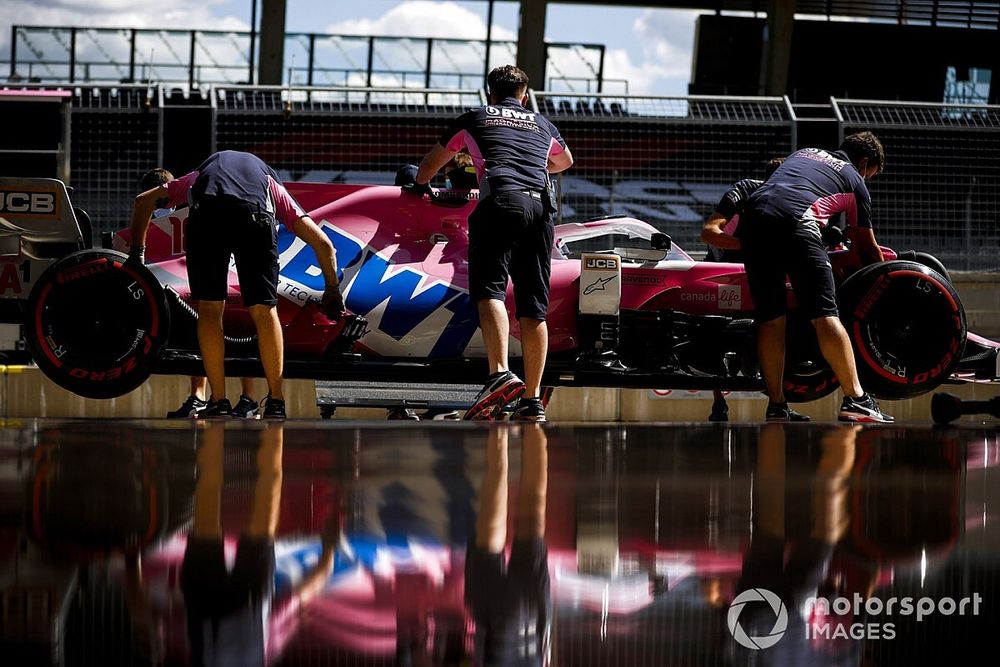 Lance Stroll, Racing Point RP20, is returned to the garage