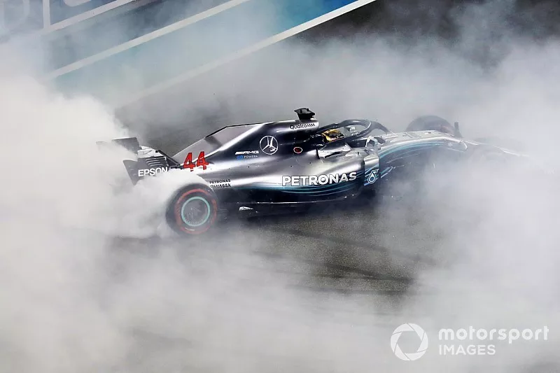 Lewis Hamilton, Mercedes AMG F1 W09 EQ Power+, performs doughnuts on the grid after winning the race