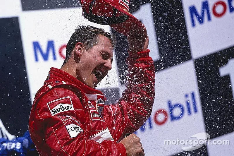 Michael Schumacher, Ferrari, celebrates his 1st position on the podium