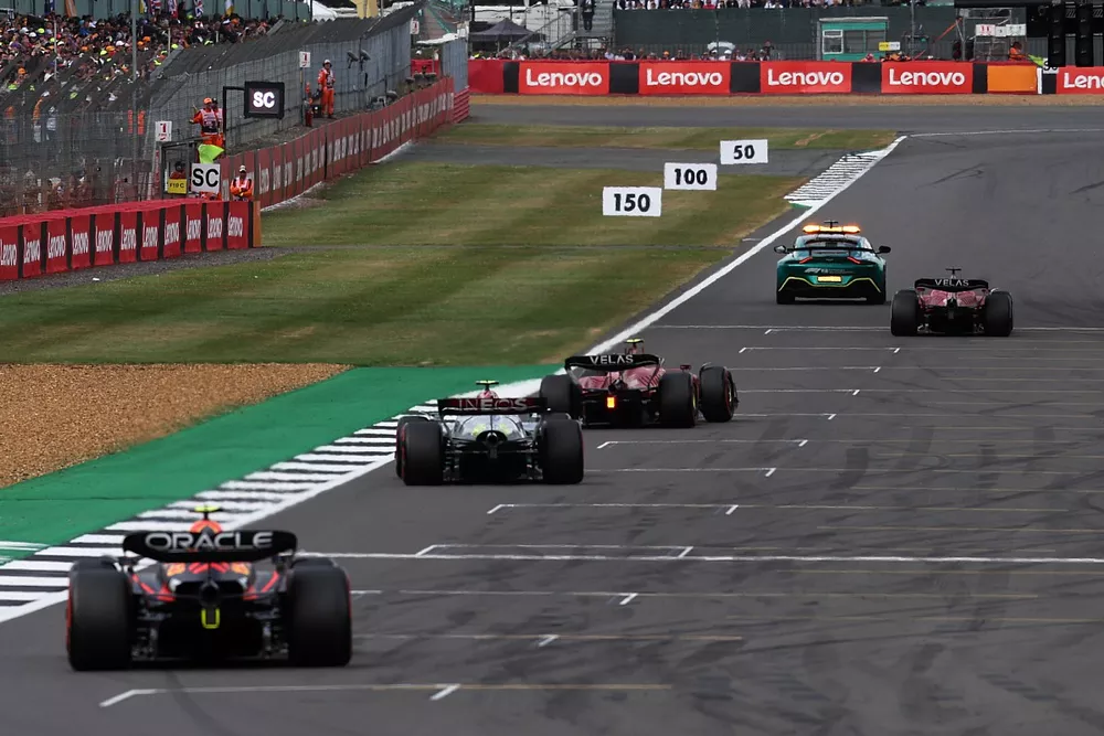 The Safety Car Charles Leclerc, Ferrari F1-75, Carlos Sainz, Ferrari F1-75, Lewis Hamilton, Mercedes W13