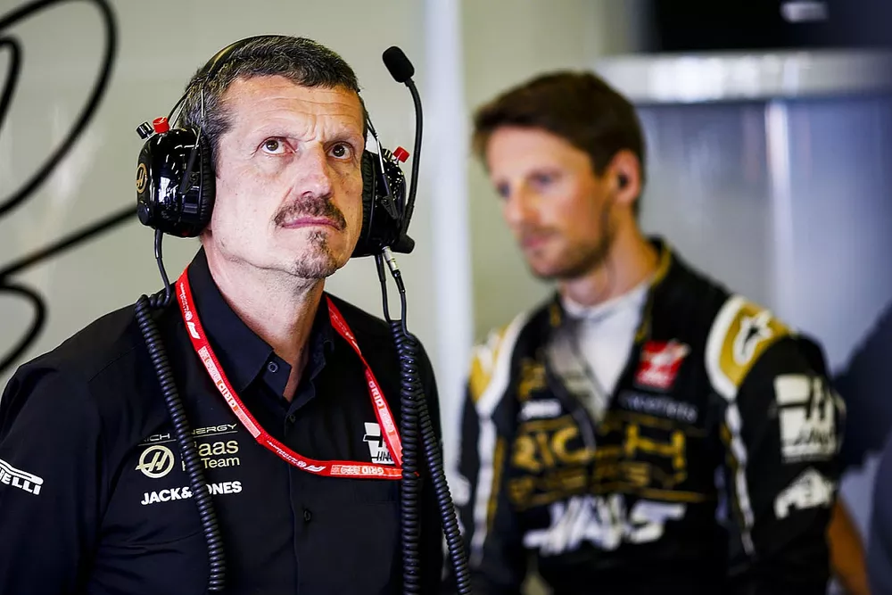 Guenther Steiner, Team Principal, Haas F1, and Romain Grosjean, Haas F1