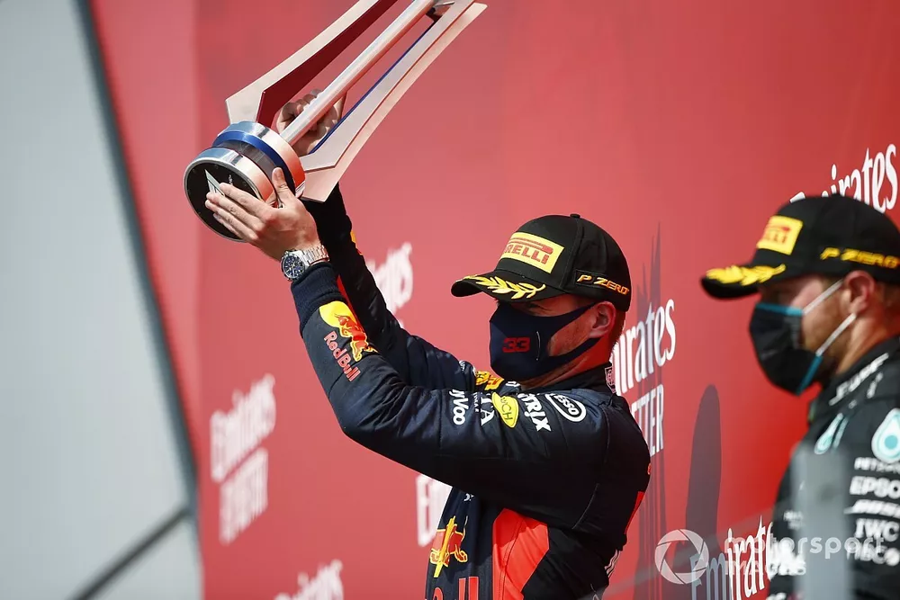 Max Verstappen, Red Bull Racing, celebrates on the podium with Lewis Hamilton, Mercedes AMG F1 and Valtteri Bottas, Mercedes AMG F1