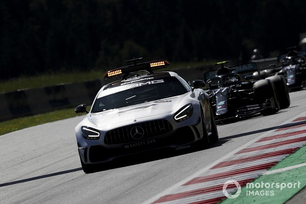 The Safety Car leads Valtteri Bottas, Mercedes F1 W11 EQ Performance