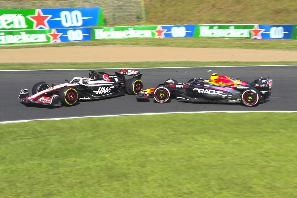 Choque Sergio P&eacute;rez, Red Bull RB19, Kevin Magnussen, Haas VF-23