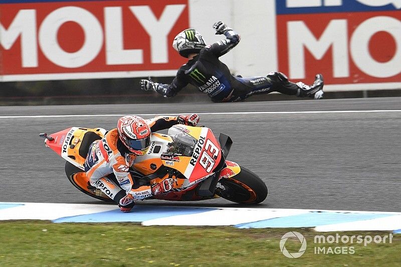 Marc Marquez, Repsol Honda Team, Maverick Vinales, Yamaha Factory Racing crashing in the background