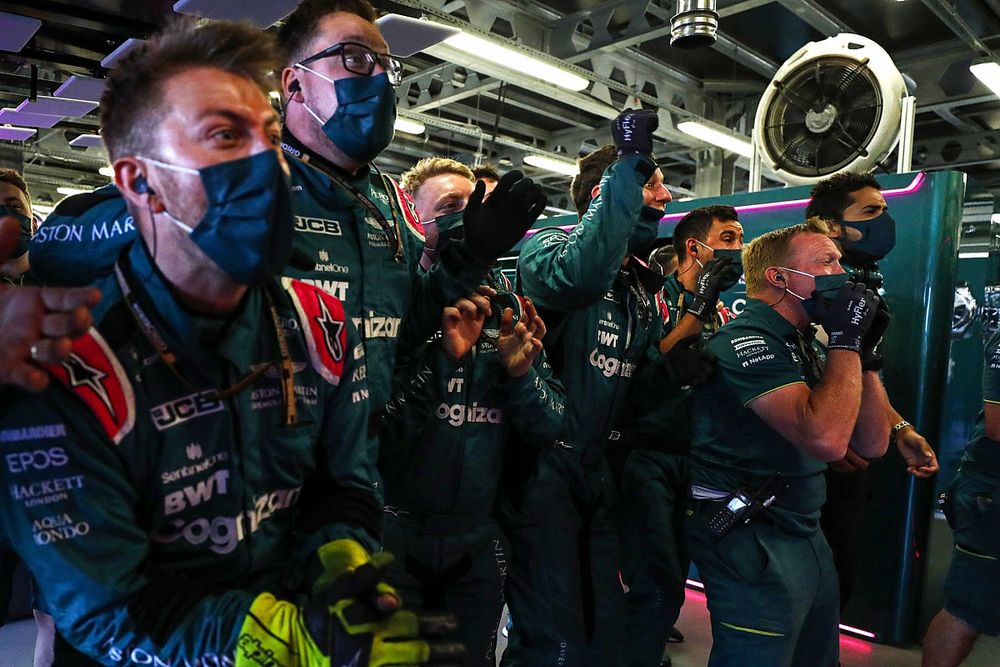 The Aston Martin team celebrate in Parc Ferme as Sebastian Vettel, Aston Martin, takes second position in the race