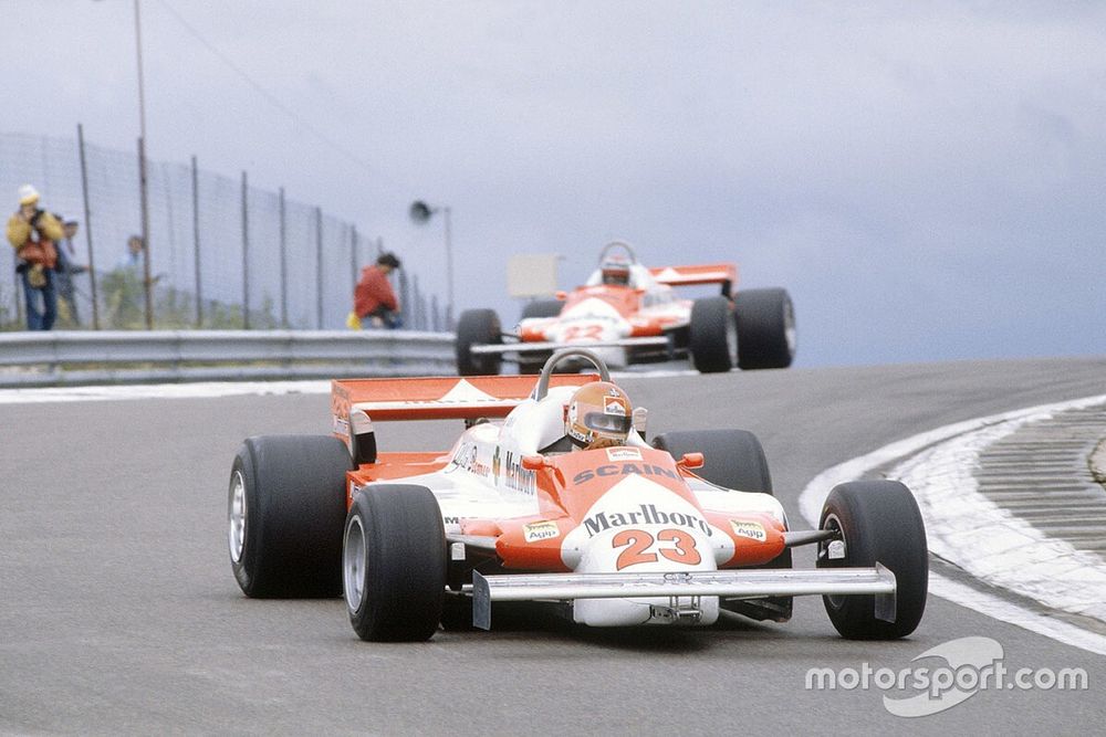 Bruno Giacomelli, Alfa Romeo 179B leads Mario Andretti, Alfa Romeo 179B