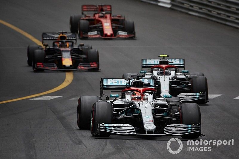 Lewis Hamilton, Mercedes AMG F1 W10, leads Valtteri Bottas, Mercedes AMG W10, Max Verstappen, Red Bull Racing RB15, and Sebastian Vettel, Ferrari SF90