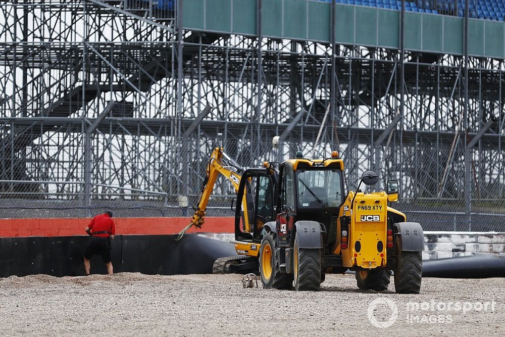 JCB machines are used to work on a barrier