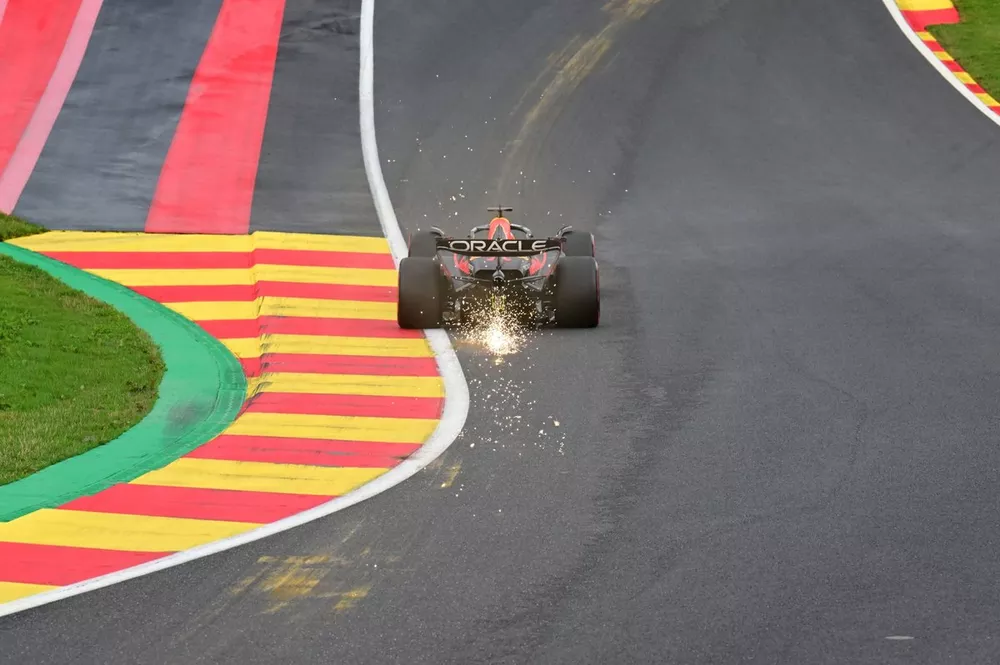 Max Verstappen, Red Bull Racing RB19, kicks up sparks