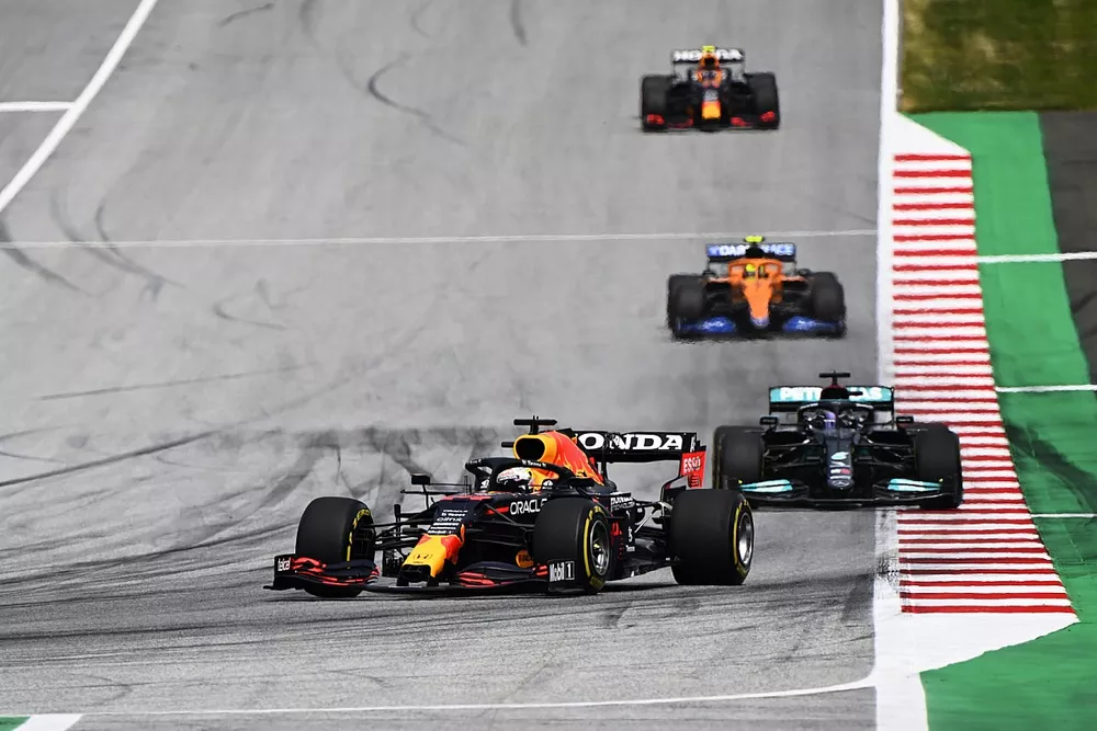 Max Verstappen, Red Bull Racing RB16B, Lewis Hamilton, Mercedes W12, Lando Norris, McLaren MCL35M, and Sergio Perez, Red Bull Racing RB16B