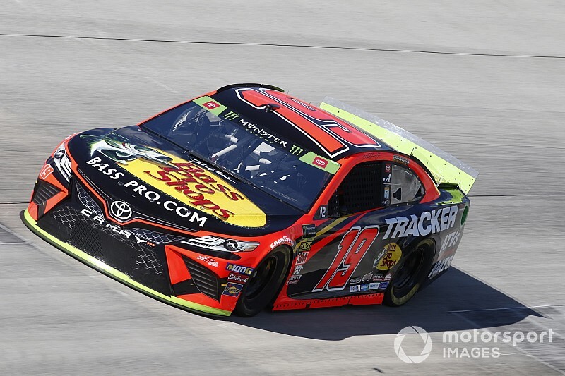 Truex takes advantage of slower traffic, wins Stage 2 at Dover