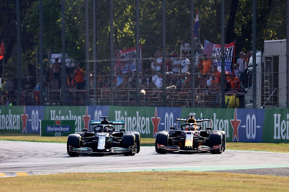 Lewis Hamilton, Mercedes W12, battles with Max Verstappen, Red Bull Racing RB16B