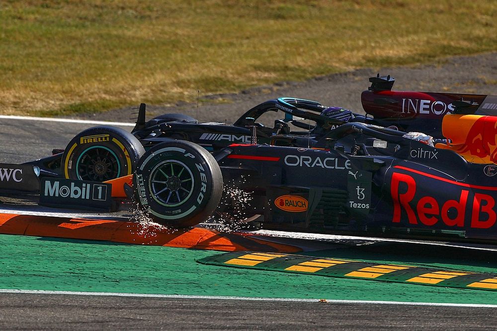 Lewis Hamilton, Mercedes W12, and Max Verstappen, Red Bull Racing RB16B, collide