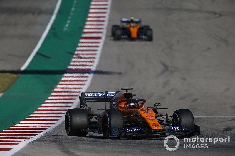 Carlos Sainz Jr., McLaren MCL34, leads Lando Norris, McLaren MCL34