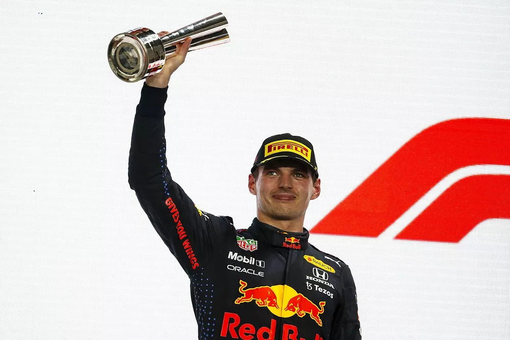 Max Verstappen, Red Bull Racing, 2nd position, lifts his trophy on the podium