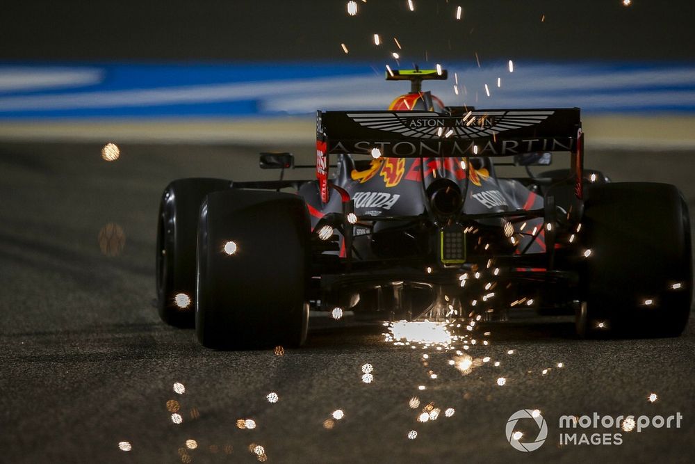 Sparks fly from the rear of Alex Albon, Red Bull Racing RB16