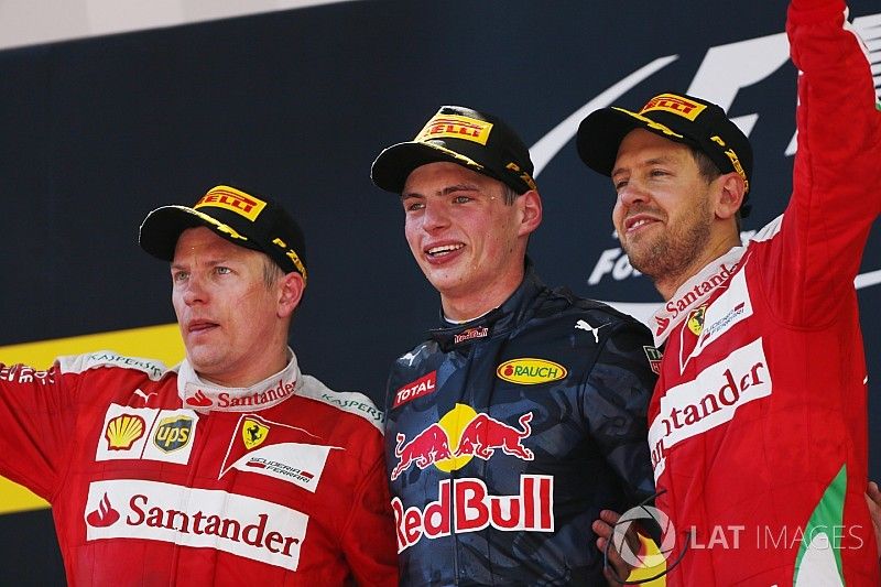 Kimi Raikkonen, Ferrari, 2nd Position, Max Verstappen, Red Bull Racing, 1st Position, and Sebastian Vettel, Ferrari, 3rd Position, on the podium