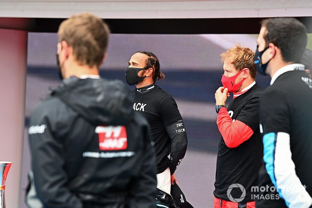 Lewis Hamilton, Mercedes-AMG Petronas F1, Sebastian Vettel, Ferrari, and the other drivers stand on the grid in support of the End Racism campaign